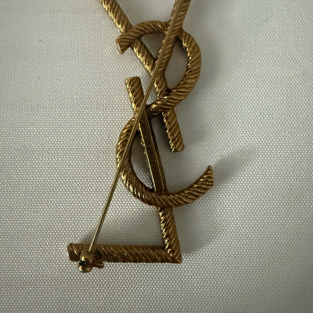 Brand new YSL rustic Gold Brooch Aprox 2.5”h by 1”w - Picture 2 of 3